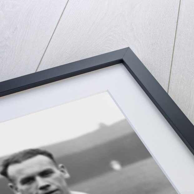 Don Revie poses with Alex Scott by JONES