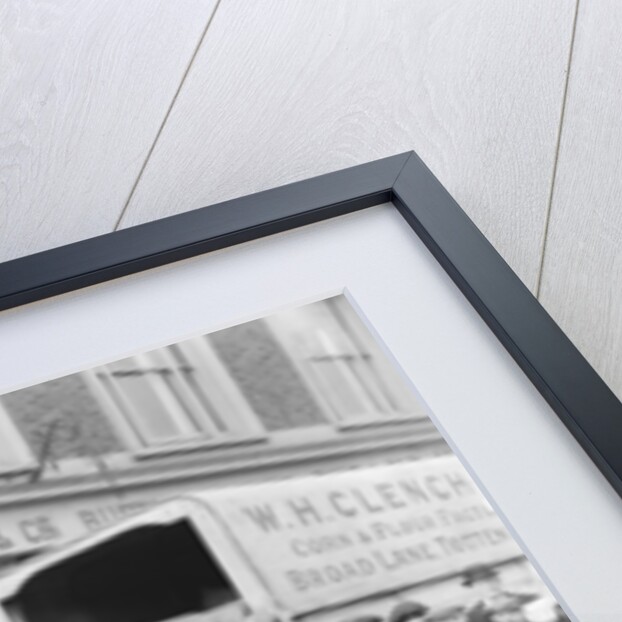 Commuters waiting for buses and make shift public transport by Staff