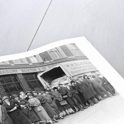 Commuters waiting for buses and make shift public transport by Staff