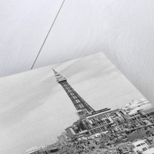 Blackpool Tower with people sitting on Blackpool Beach by Anonymous