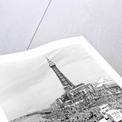 Blackpool Tower with people sitting on Blackpool Beach by Anonymous