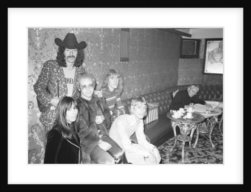 Elton John and his group pose for pictures by Alistair MacDonald