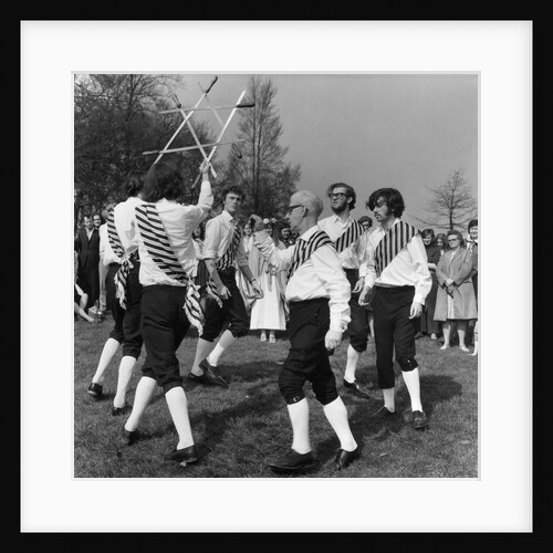 Morris dancer performing during the may day festival by Staff