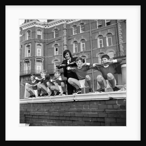 George Best with kids, Blackpool, 1970 by Staff