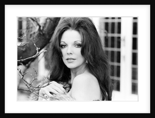 Joan Collins by Staff