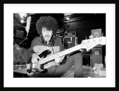 Phil Lynott of Thin Lizzy during a recording session for the groups new album. by Andy Hosie