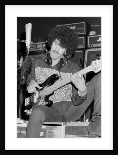 Phil Lynott of Thin Lizzy during a recording session for the groups new album. by Andy Hosie