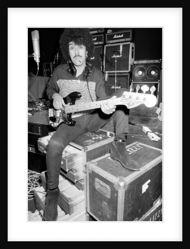 Phil Lynott of Thin Lizzy during a recording session for the groups new album. by Andy Hosie