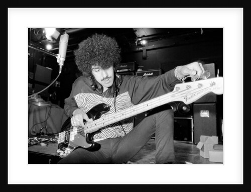 Phil Lynott of Thin Lizzy during a recording session for the groups new album. by Andy Hosie