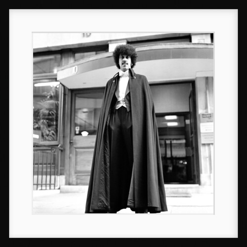 Phil Lynott in London, modelling clothes from Saville Row. 1983 by Mike Maloney