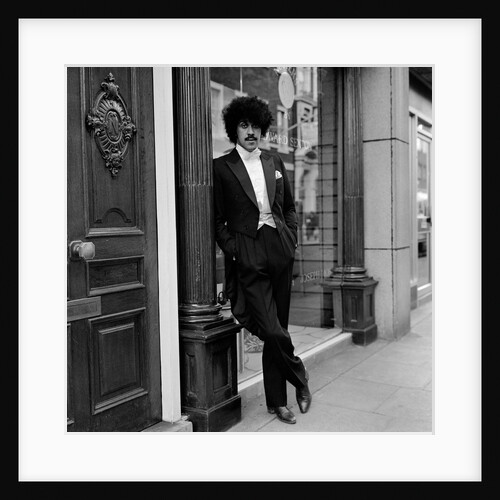 Phil Lynott in London, modelling clothes from Saville Row. 1983 by Maloney