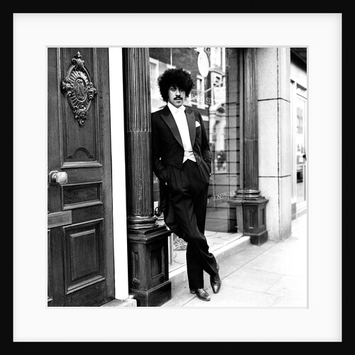 Phil Lynott in London, modelling clothes from Saville Row. 1983 by Maloney