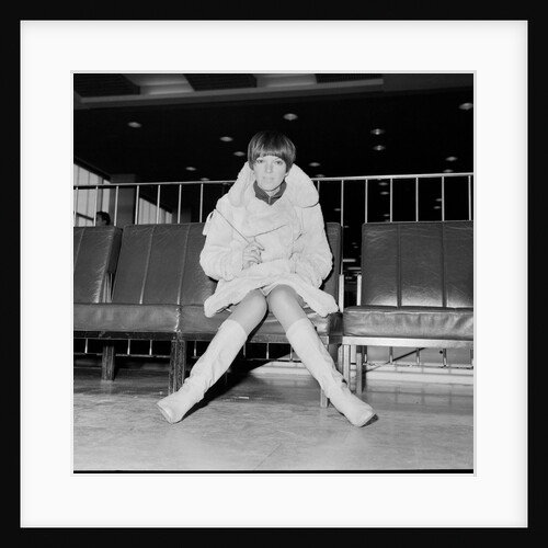 Mary Quant, at London Airport, on her way to Paris to go to a fancy dress ball. by Staff