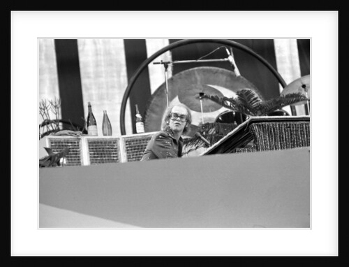 Elton John performing on stage at Wembley Stadium., London, England in June 1975 by Chris Barham