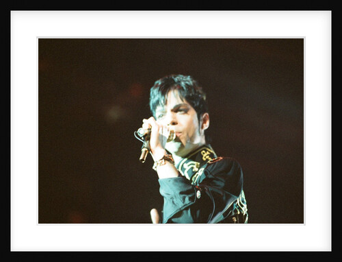 Prince performing on stage during his 'Ultimate Live Experience Tour' by Richard Nelmes