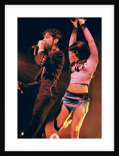 Prince performing on stage during his 'Ultimate Live Experience Tour' by Richard Nelmes