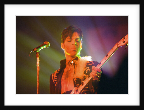 Prince performing on stage during his 'Ultimate Live Experience Tour' by Richard Nelmes