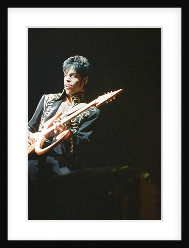 Prince performing on stage during his 'Ultimate Live Experience Tour' by Richard Nelmes