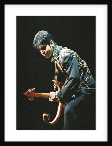 Prince performing on stage during his 'Ultimate Live Experience Tour' by Richard Nelmes