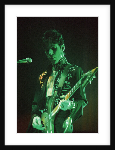 Prince performing on stage during his 'Ultimate Live Experience Tour' by Richard Nelmes