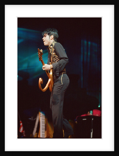 Prince performing on stage during his 'Ultimate Live Experience Tour' by Richard Nelmes