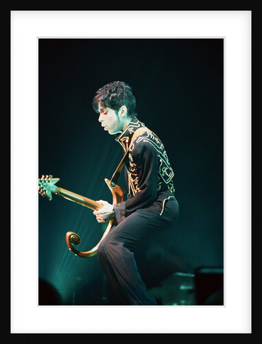 Prince performing on stage during his 'Ultimate Live Experience Tour' by Richard Nelmes
