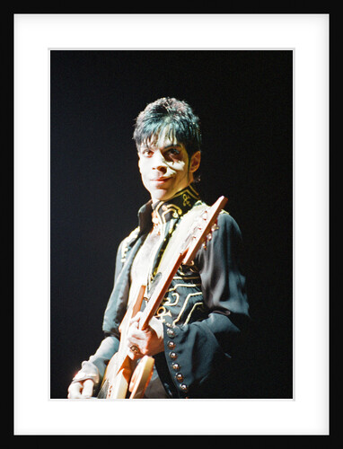Prince performing on stage during his 'Ultimate Live Experience Tour' by Richard Nelmes