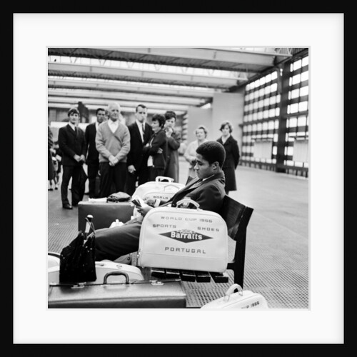 Eusebio surrounded by autograph hunters at Manchester's Piccaddilly station by Anonymous