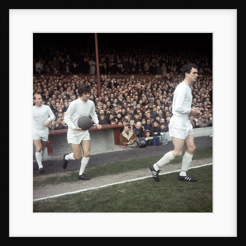 Johnny Aston leads Manchester United team mates onto the pitch by MSI