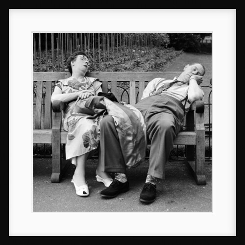 Old couple dozing in the sun at Serpentine Lido by Bob Hope