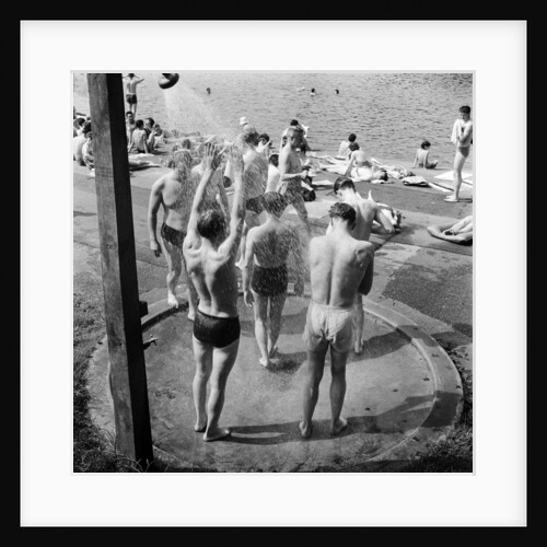 People sunbathing in a heatwave at the Serpentine Lido by Tommy Lea