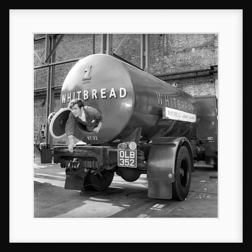 A tanker driver cleaning out the inside of his vehicle by Anonymous