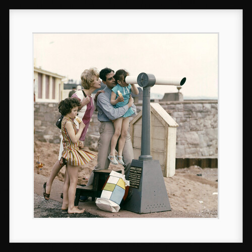 A family at the seaside by Anonymous