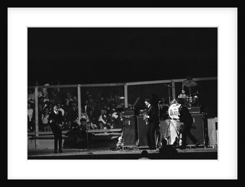 The Beatles on stage at the Cow Palace in San Francisco by Anonymous