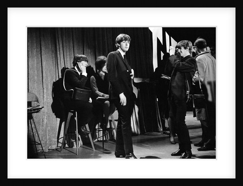 Ringo Starr taking pictures of Paul McCartney by Henry Grossman
