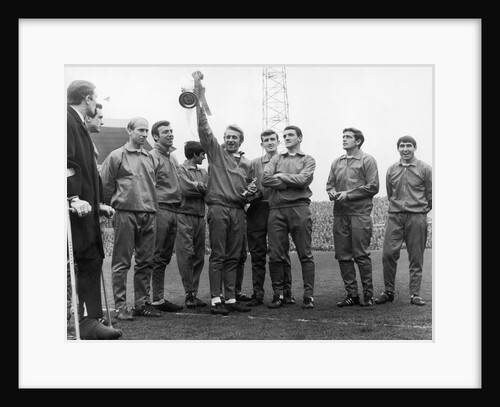 Dennis Law holding the Division One Championship trophy by Staff