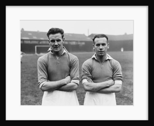 Don Revie poses with Alex Scott by JONES