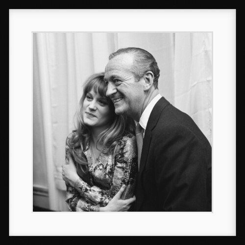 David Niven with Francoise Dorleac by Harry Arnold