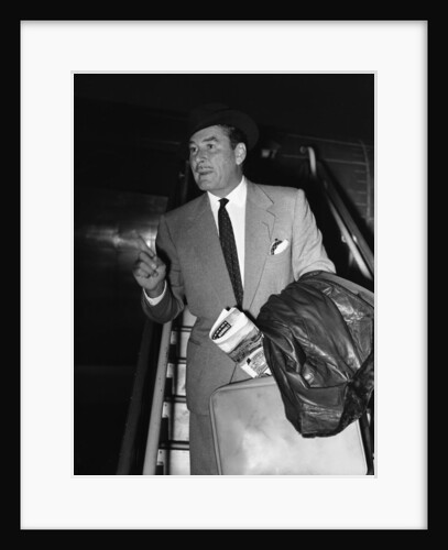 Errol Flynn arriving at London Airport 17th November 1953 by Anonymous