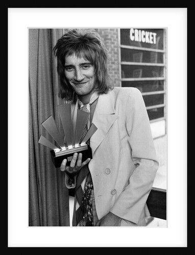 Rod Stewart with his Top Male Singer Award by Staff