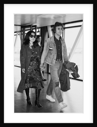 John Lennon with his wife Yoko Ono leaving Heathrow Airport by Anonymous