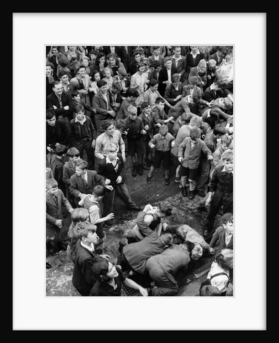 Throwing hot pennies to children at Honiton Fair by Staff