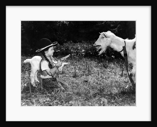 Gerald Portlock's grand daughter 'holds up' the Nanny goat by Staff