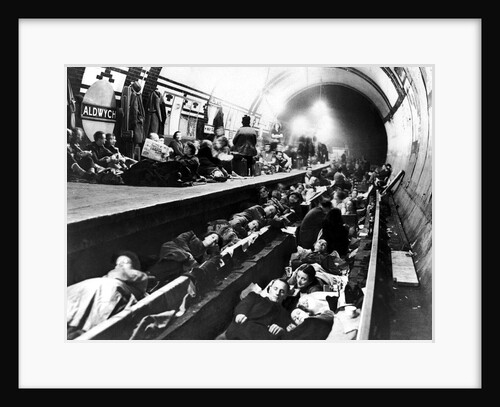 Londoners use Aldwych Underground Station as an air raid shelter by Staff