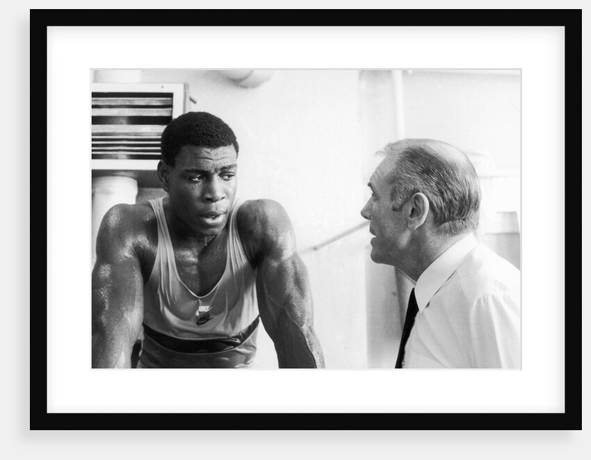 Frank Bruno with his trainer by Anonymous