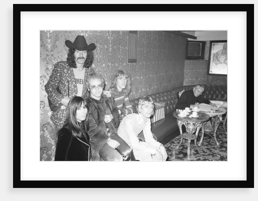 Elton John and his group pose for pictures by Alistair MacDonald