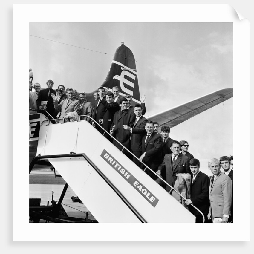 Everton team members wave before their plane departs from Speke airport by Charlie Owens