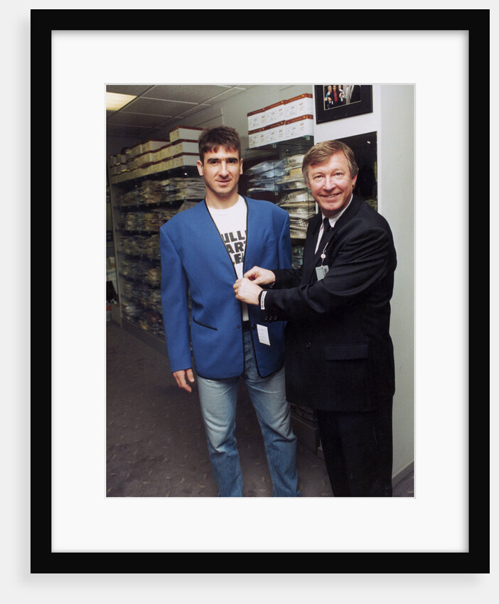 Alex Ferguson with Eric Cantona in a clothes shop by Holland