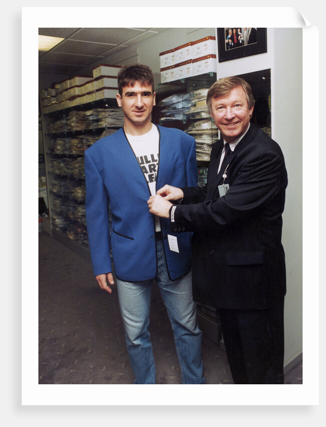 Alex Ferguson with Eric Cantona in a clothes shop by Holland