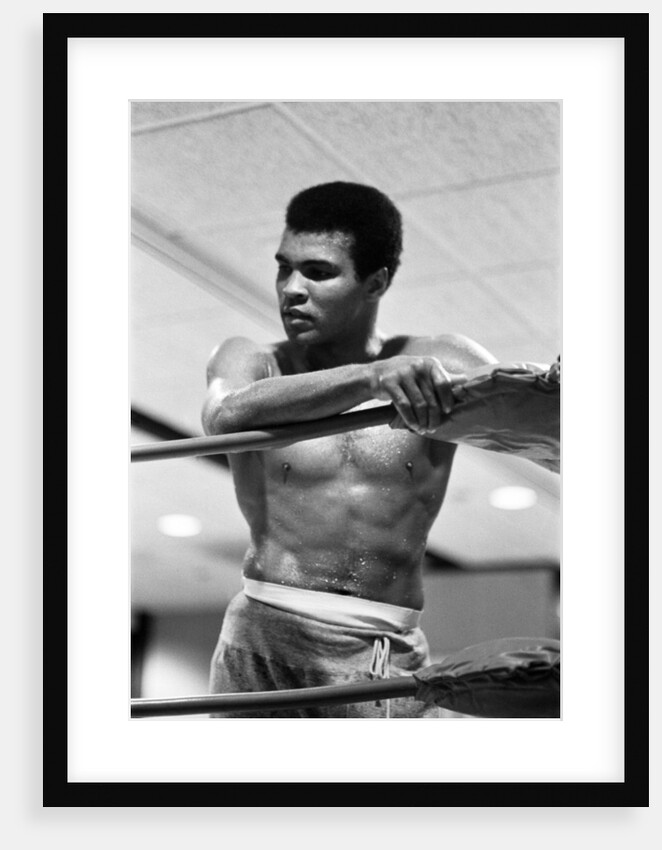 Muhammad Ali takes a breather from trainnig by Cyril Maitland